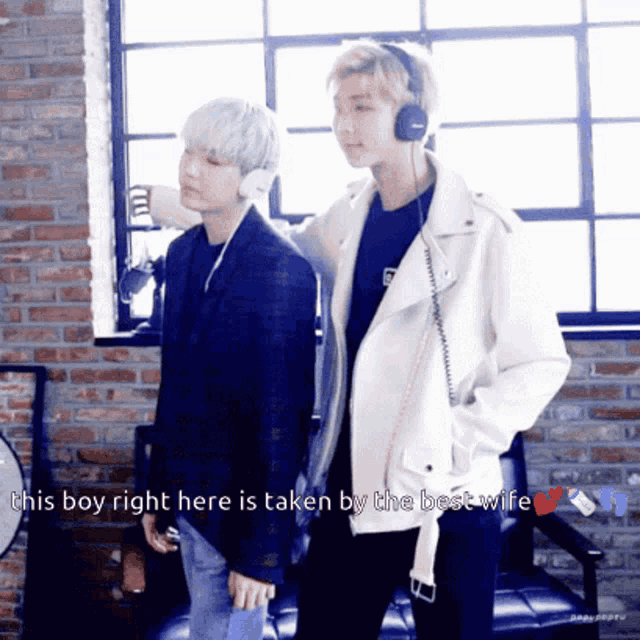 two men standing next to each other with the caption " his boy right here is taken by the best wife " on the bottom