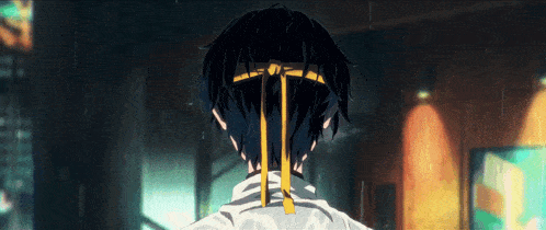 a person with a yellow ribbon tied to their hair