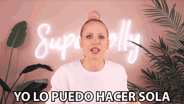 a woman in front of a sign that says superolly