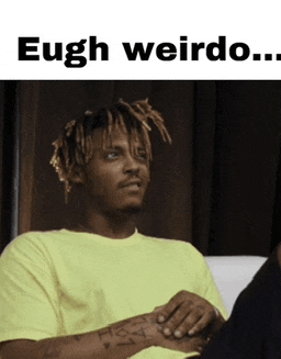 a man sitting on a couch with the words eugh weirdo