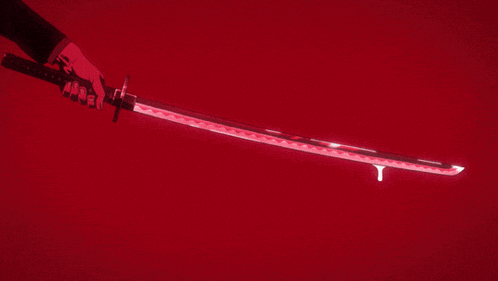 a person is holding a sword with a red glowing blade