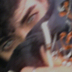 a close up of a person 's face with a blurred background