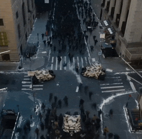 an aerial view of a crowded city street with a sign that says no parking
