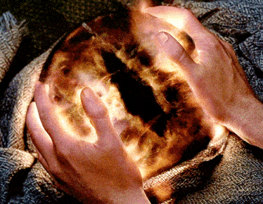 a person is holding a glowing sphere in their hands