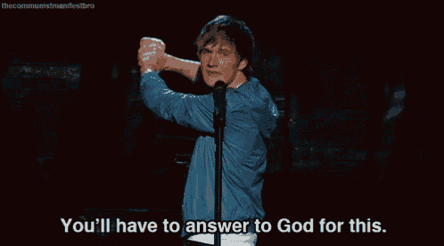 a man stands in front of a microphone with the words " you 'll have to answer to god for this " below him