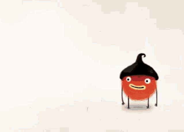 a cartoon character standing next to a cake with a flag on top