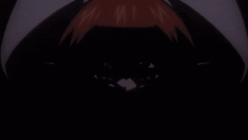 a close up of a girl with red hair