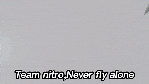 a jet is flying in the sky with the words team nitro never fly alone below it
