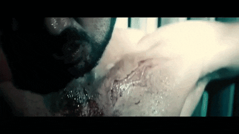 a close up of a person 's chest with blood on it