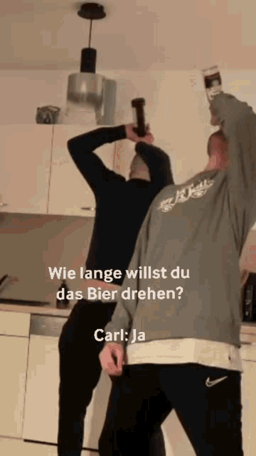 two men holding bottles in a kitchen with the caption " wie lange willst du das bier drehen carl ja "