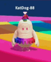 a cartoon character is standing on a colorful surface with katdog-88 written on the bottom .