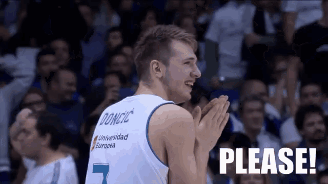 a basketball player wearing a jersey with the word donic on it