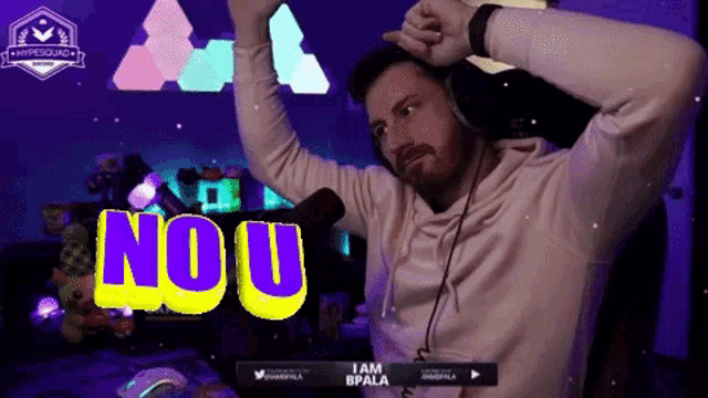 a man wearing headphones is dancing in front of a microphone with the word nou in yellow