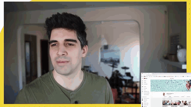 a man stands in front of a computer screen that says youtube on it