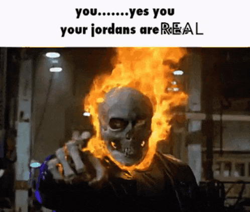 a ghost rider with fire coming out of his head
