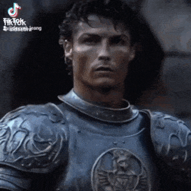 a close up of a man wearing armor with a tiktok watermark
