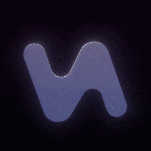 the letter n is glowing in the dark with sparkles around it
