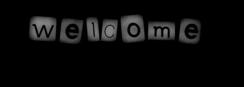 a black and white image of the word welcome on a black background