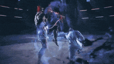 two men are fighting in a video game and one of them is holding a red sword