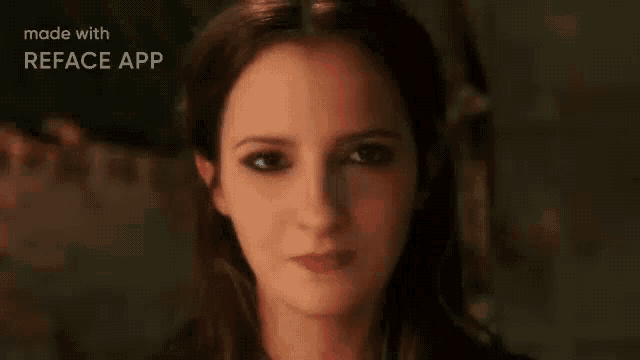 a close up of a woman 's face with the words made with reface app on the bottom