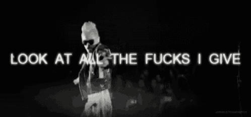 a black and white photo of a man with the words look at all the fucks i give behind him