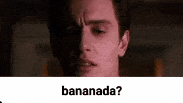 a close up of a man 's face with a caption that says bananada .