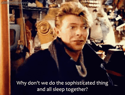 a man is asking why do n't we do the sophisticated thing and all sleep together ?