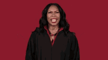 a woman is making a funny face and says get your