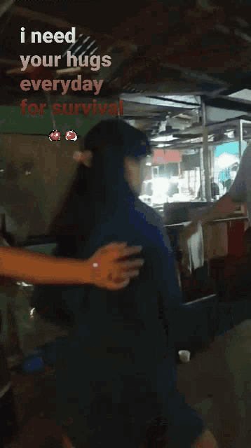 a man and woman hugging with the words " i need your hugs everyday for survival " above them
