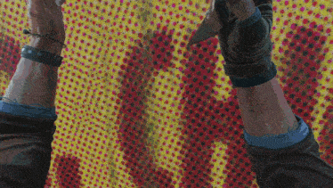 a person 's arms are shown with bracelets on them