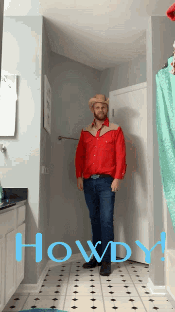 a man in a red shirt and cowboy hat stands in a hallway with the word howdy written in blue