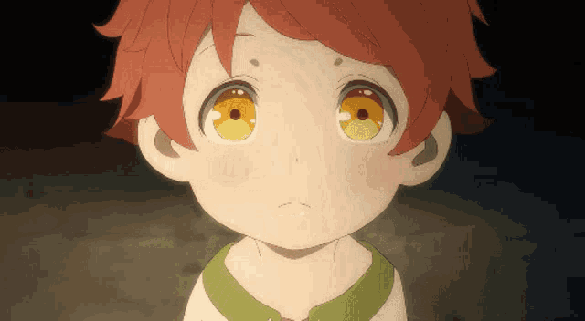 a close up of a child 's face with yellow eyes and red hair