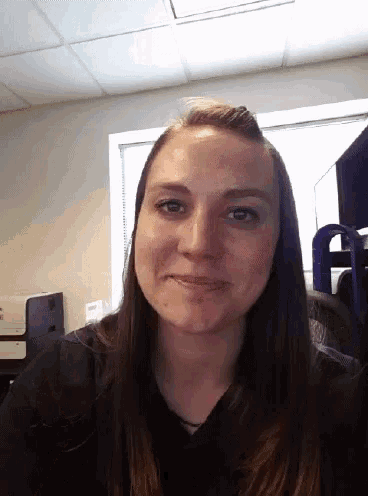 a woman making a funny face with her mouth open
