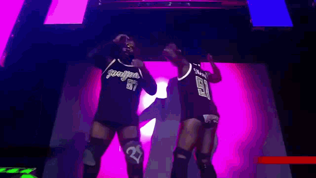 willie mack and rich swann are two wrestlers on a stage