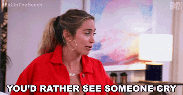 a woman says " you 'd rather see someone cry "
