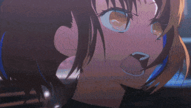 a close up of a girl 's face with a surprised expression