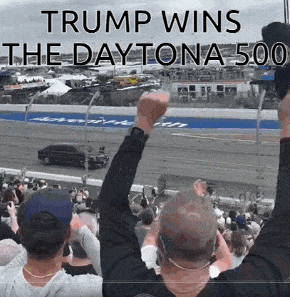 a crowd of people watching a race with the words trump wins the daytona 500