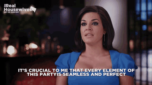 a woman in a blue dress says it 's crucial to me that every element of this party 's seamless and perfect