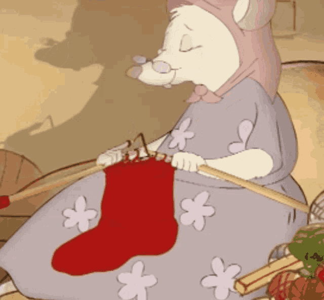 a cartoon drawing of a mouse knitting a red sock
