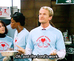 a man wearing a hungry hands t-shirt says " oh just the lord 's work "