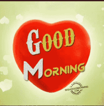 a red heart says good morning on a green background