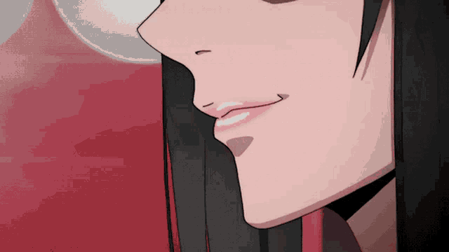 a close up of a woman 's face with a smile on her face