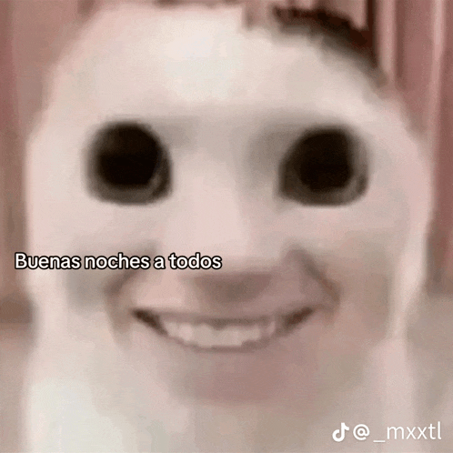 a close up of a person 's face with the caption buena noches a todos