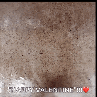 a brown background with the words " happy valentine " and a red heart