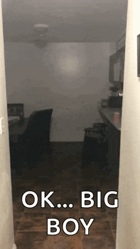 a dark hallway with the words ok big boy on the bottom