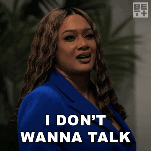 a woman in a blue suit says i do n't wanna talk