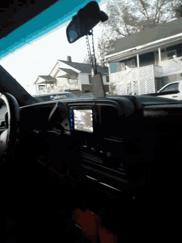 the inside of a car with the word chevrolet on the steering wheel
