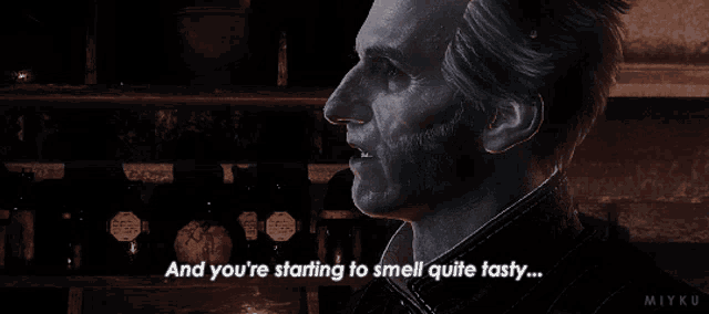 a man says " and you 're starting to smell quite tasty " in a dark room