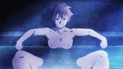 a man is sitting in a bathtub with his arms outstretched