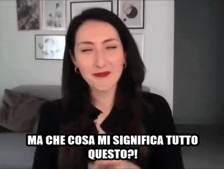 a woman is making a funny face and says ma che cosa mi significa tutto questo ?